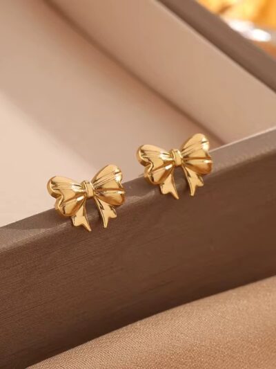 Mini bow ear studs